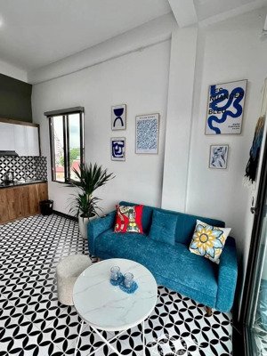 bán toà chdv hào nam - hoàng cầu. dt 70m2 x 7t . 17p khép kín. dt 110tr/ tháng. ngõ thông, gần phố