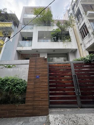 nhà đẹp huỳnh văn bánh , phú nhuận 10x22,5 tầng tháng máy thu nhập 120tr giá 30 tỷ