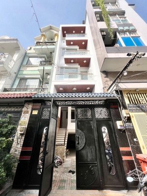 5tầng - hầm để xe - hẻm 8m - nhà mới vào ở liền - hẻm thông an ninh - 427 lê văn quới