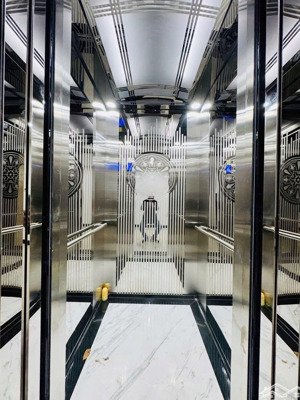 bán căn nhà sổ đỏ chính chủ ô góc mặt phố lạc long quân , dt 70m2 x 7t , mt 22m , giá 50 tỷ