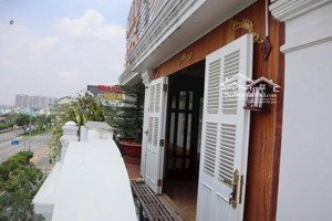 bán tòa nhà mt võ văn kiệt ngang 13.5m có hầm showroom 268m2 công nhận 6 tầng kiên cố