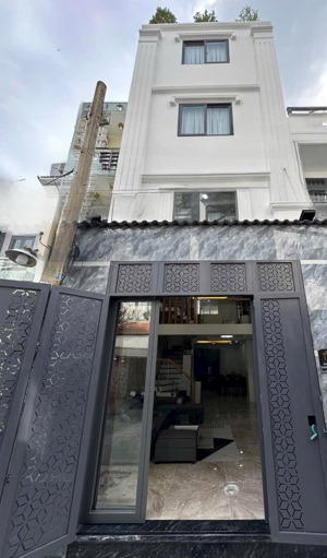 bán nhà 1 trệt 1 lửng 2 lầu sân thượng. hẻm 1 sẹc. xe hơi. nguyễn văn khối p11 gv. dt 4 x 12m