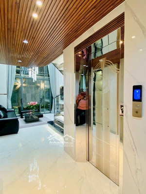 nhà mới ở ngay full nội thất 6 tầng - có thang máy - ngay lotte nguyễn văn lượng - đường xe tải 7m