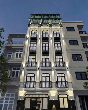 bán chdv hoàng ngọc phách đống đa - dt 59m2 - 7 tầng thang máy - lô góc - ô tô đỗ cổng - 22.x tỷ