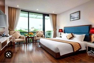 bán khách sạn hoàng cầu, đống đa ngõ ô tô 8 tầng thang máy, 14 phòng khép kín, 65m2 24 tỷ