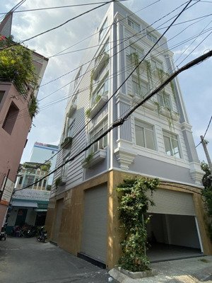 nhà nguyên căn mt đường trần huy liệu, phường 8. dt: 7x17m. trệt - 4 lầu sân thượng. thang máy