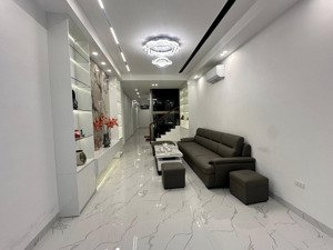 nhà đẹp hoàng cầu-đống đa 82m2 x 7 tầng thang máy-ngõ ôtô thông-2 thoáng trước sau giá chỉ 316tr/m2