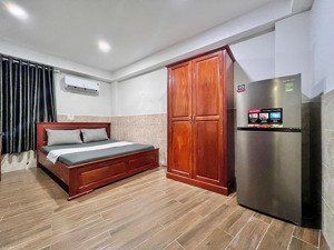 cho thuê phòng mới full nội thất-thang máy-bảo vệ 24/24