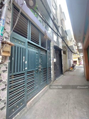 chợ tân bình, lạc long quân, đông hồ. kế xe hơi. 4,3*12m, 4tầng..