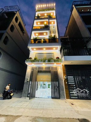 nhà phố cao cấp mới ở ngay 107m2 ( 4.5 x23 ) 6 tầng gần đại học giao thông- tân chánh hiệp xe tải