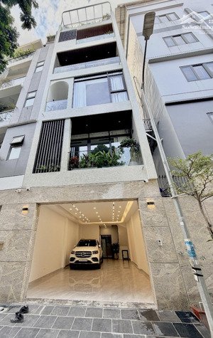 đáng mua- 75m2- mt 5m- vỉa hè 02 bên- 7 tầng thang máy- nội thất tinh xảo- gara 02 ô tô 7 chỗ