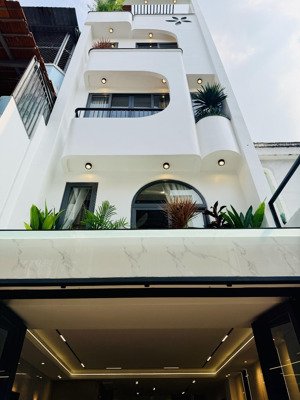 bán nhà hẻm xe hơi 105/ đường59(phạm văn chiêu) p14 trệt lửng 3 lầu