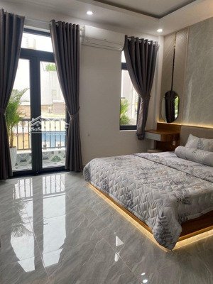 nhà mới nguyễn thị kiểu sát mặt tiền 84m 6 tầng full nội thất