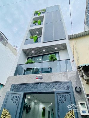 siêu phẩm 5 tầng thang máy - 2 mặt hẻm xe hơi - xây mới 100% - ngay bờ kênh tham lương - thống nhất