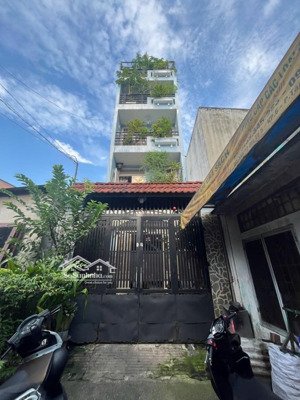 bán nhà quận 12 - ngay mặt tiền - có sân đậu xe hơi - 70m2, 5 tầng bề thế - giá nhỉnh 6 tỷ