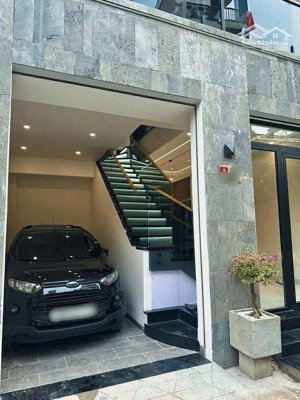 bán nhà quận 2 mặt tiền đường ô tô cách nguyễn duy trinh chỉ 20m ngang 6.5m gara 3 tầng. giá tlcc