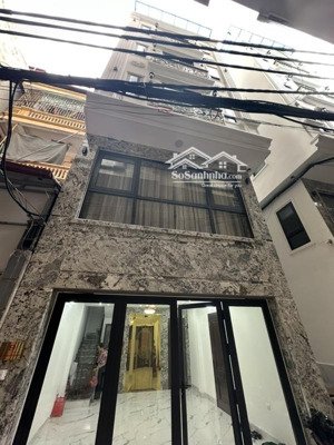 lô góc trần duy hưng 52m2 - gara oto - kinh doanh - mặt tiền 5 m - 6 tầng thang máy.