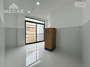 nhà mới giá rẻ ngay ngã tư phú nhuận có máy giặt riêng