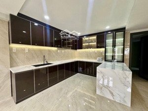 võ văn kiệt q5 - nhà 5 tầng - ngang 7,6m có thang máy - xe hơi ngủ trong nhà - hơn 19tỷ tl