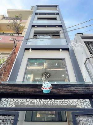 bán nhà cmt8 quận 3 giáp quận 10, 5 tầng có thang máy, xe hơi đỗ cửa, hoàn công đủ, giá 8.99 tỷ