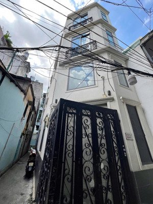 bán nhà cmt8 q3 50m2 nhà góc 5 tầng dòng tiền 25tr 7,7 tỷ tl