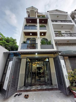 nhà đẹp hxh 1 sẹc bùi quang là, p.12, gò vấp,ngang 5m, 4 lầu. 8,9 tỷ