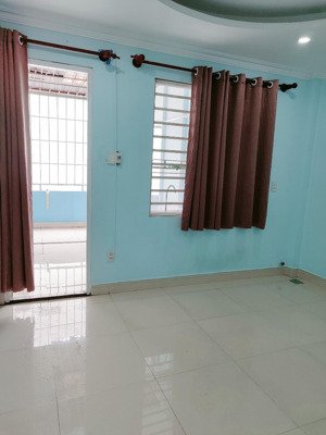 cho thuê phòng quận 7, 1 phòng ngủ tách bếp có ban công sau thoáng mát