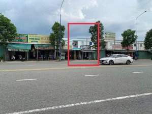 bán căn nhà trọ mặt tiền đường nhựa 22,5m kinh doanh tốt dt 140m2 gồm 1kiot 4phòng thu nhập 8tr shr