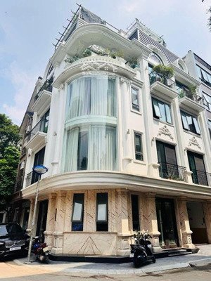 tòa nhà mặt phố mới tinh phố thái thịnh, đống đa. dt 90m2, 8 tầng , thang máy, 25 phòng, lô góc.