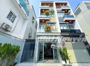 nhà phố hiện đại 3 lầu kdc cao cấp có gara xe hơi