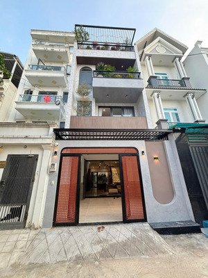 nhà phố mới hiện đại 3 lầu (5x20)m, đường xe ô tô ngay cao đẳng điện lực