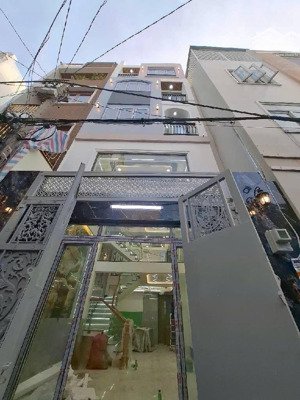 bán nhà lê văn quới, gần ngã 4 bốn xã, hẻm xe hơi, ngang lớn 4,5m, dt 54m2, 5 tầng, 5pn, chỉ 7,6 ty