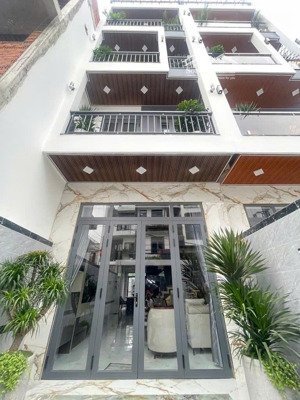 nhà mới 100% 4 tầng - hẻm xe tải 6m thông - thới an, q12