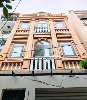 bán tòa nhà chdv mới xây dựng 100% sát mặt tiền đường duy tân p15 pn đang cho thuê 90 tr/ tháng