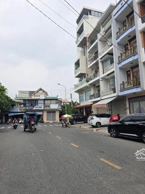 nhà bán mặt tiền hoa bằng 95m2 4 tầng ngang 4,5x20 hai mặt tiền trước sau ngay trường học tân bình