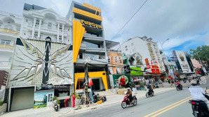 bán tòa nhà mt phan đình phùng, q. phú nhuận - dt 9 x 16m hậu 11m - hầm 4 lầu - giá 52 tỷ