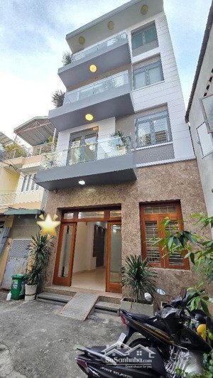 đường 6m xe hơi , ngang lớn 6m, 84m2, đúc 4 tầng. gần aeon tân phú