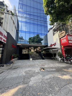 tòa nhà mt hồ văn huê pn - dt 10 x 22m - nở hậu 22m - 2 hầm - 10 tầng - giá 85 tỷ