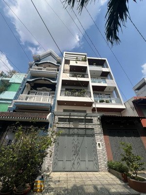 9.3tỷ, nhà 5 tầng, dtsd hơn 200m2, ngang hơn 4m, hẻm xe hơi 6m có lề sát mặt tiền đường quang trung