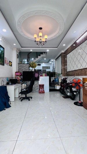 nhà 4 tầng hẻm xe hơi cách mt huỳnh tấn phát 50m