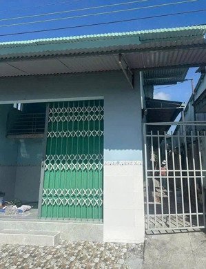 chủ ngộp bán nhà kèm 8 phòng trọ đang cho thuê full (154m2) kế bên chợ hưng long shr giá 860triệu