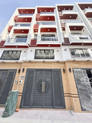 nhà mới 100% -xe hơi vào nhà -5 tầng 56m(4x14)-tiểu học kim đồng