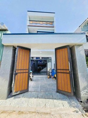 nhà phố lầu trệt gần đường nguyễn an ninh gần chợ dĩ an một