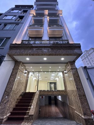 cho thuê nhà mới hoàng cầu - đặng tiến đông, 90m2 x 7 tầng, 1 hầm mt 6m, thông sàn, thang máy, 50tr