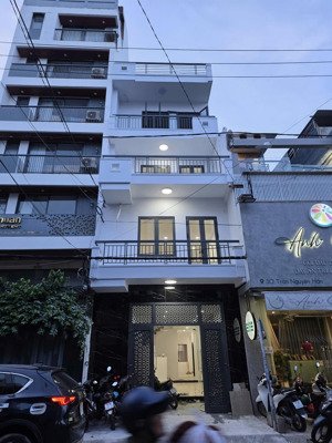 bán nhà 4 tầng mặt tiền trần nguyên hãn - ngay bên chợ xóm mới, có 10 phòng đang cho thuê tốt