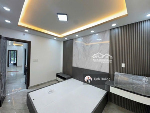 nhà mới mặt tiền vừa ở - vừa kd trần xuân soạn - quận 7 65m2 2 tầng