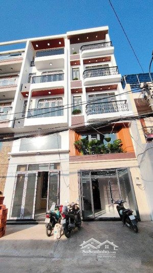 mặt tiền kinh doanh - ngay miếu gò xoài - hẻm 10m - có thang máy - nhà 5 tầng - nhỉnh 9 tỷ tl.