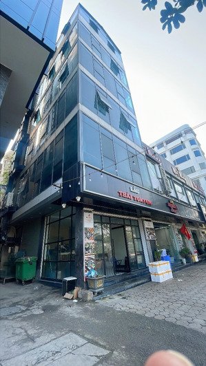 bán mặt phố trần vỹ - cầu giấy. toà văn phòng 9 tầng. lô góc 3 mặt thoáng - thang máy. vỉa hè 10m