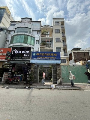 siêu vị trí ! bán nhà mt hoàng hoa thám- phan đăng lưu - dt 8x28m - 7 tầng hđt 180tr/th- giá 52 tỷ