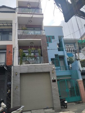 nhà mặt tiền đẹp 4 tầng - ngang 4.4m - ngay ngã tư bảy hiền - giáp quận 10